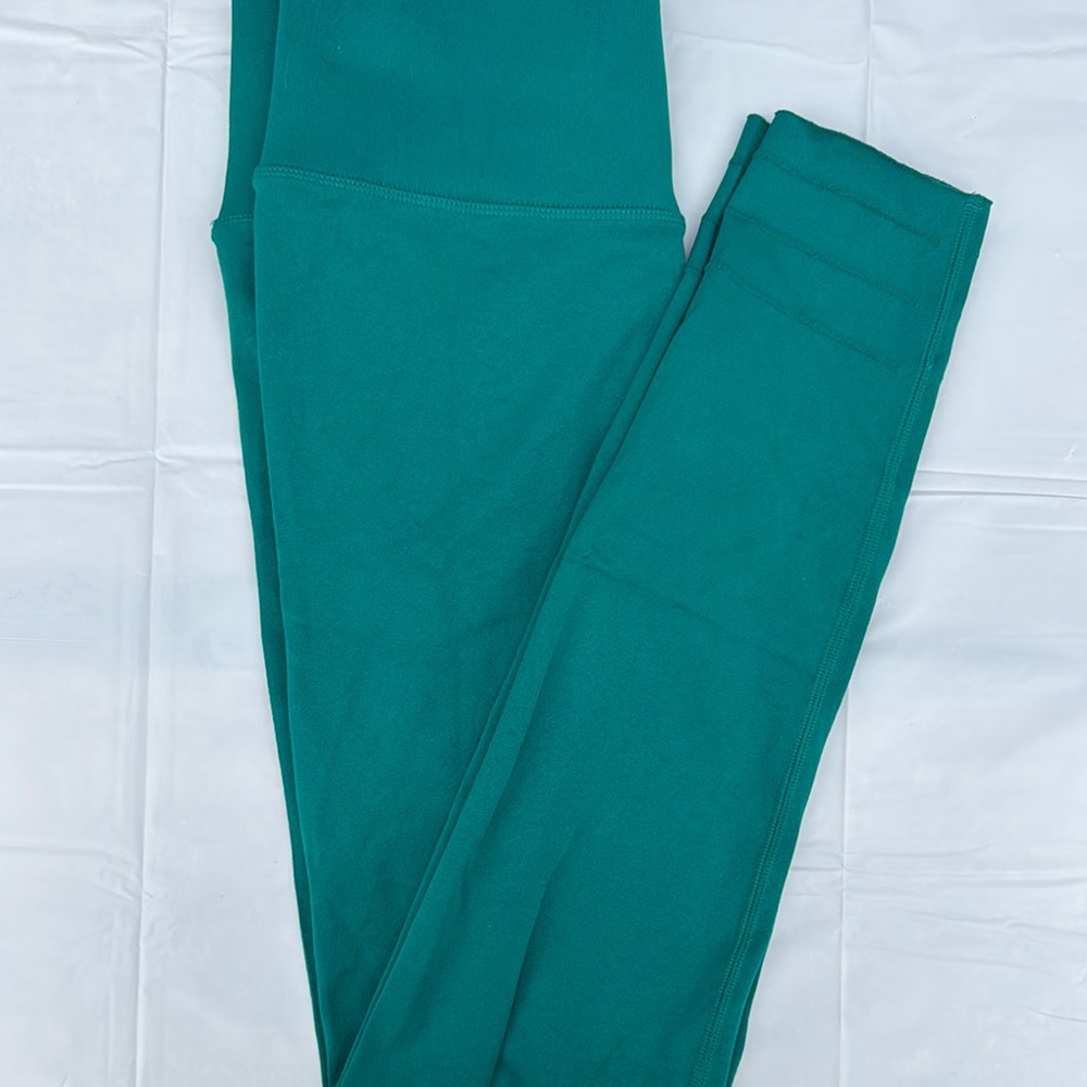 Fabletics SculptKnit® High-Waisted Green Performance Leggings with Vibrant Color